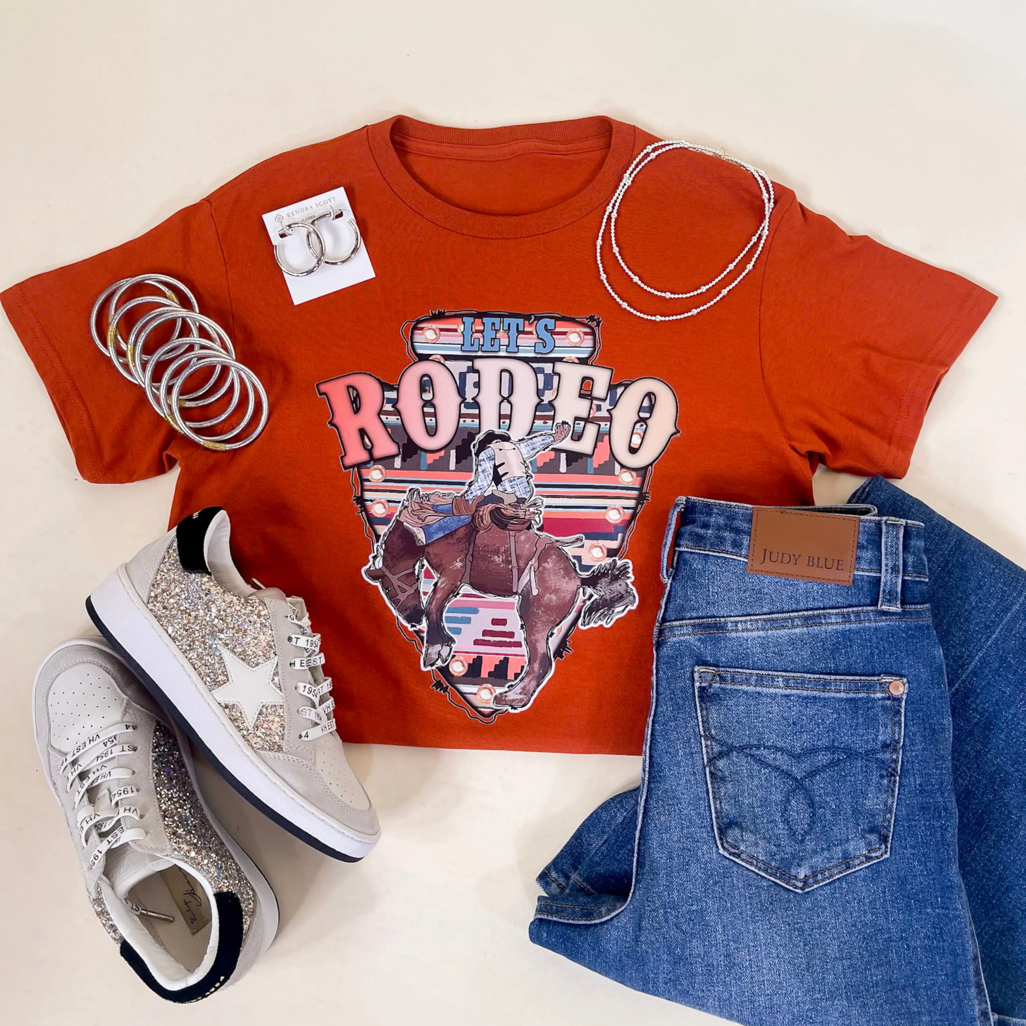 Let's Rodeo Bucking Horse Short Sleeve Graphic Tee in Burnt Orange